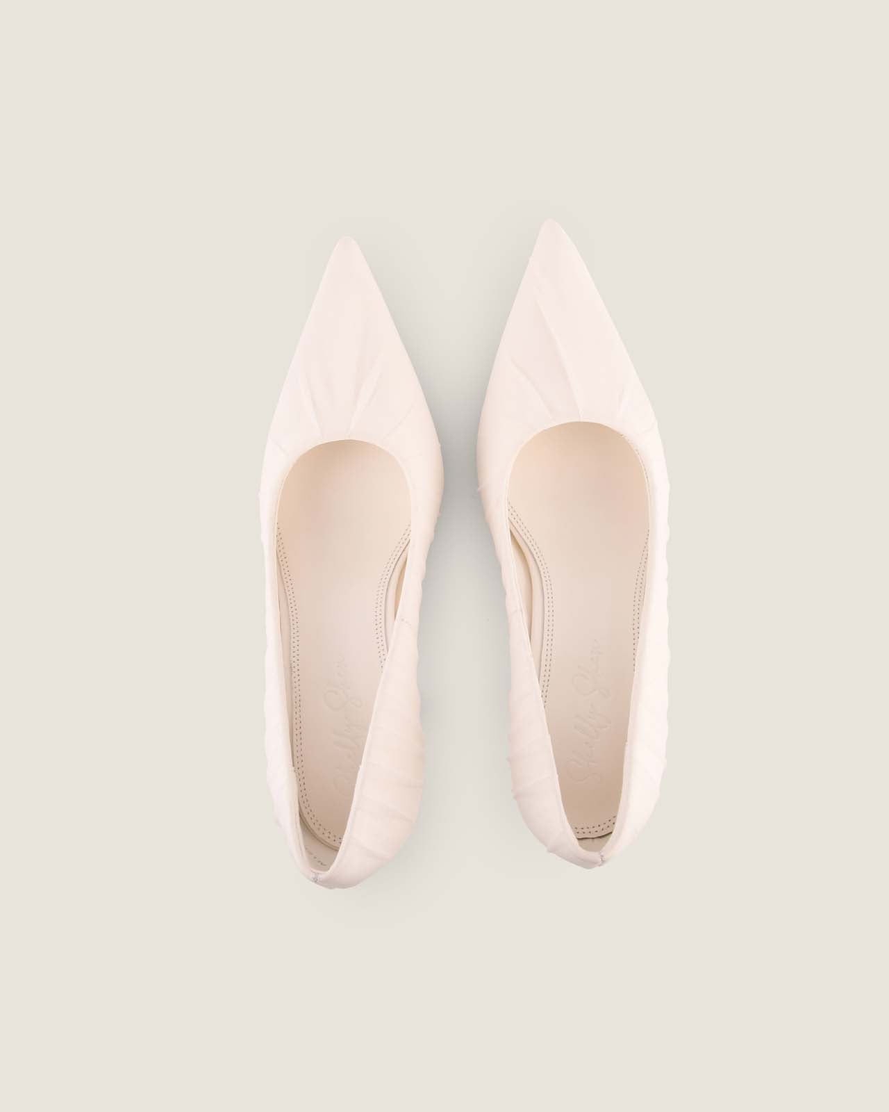 Pair of White Allegra High Heel Pumps
