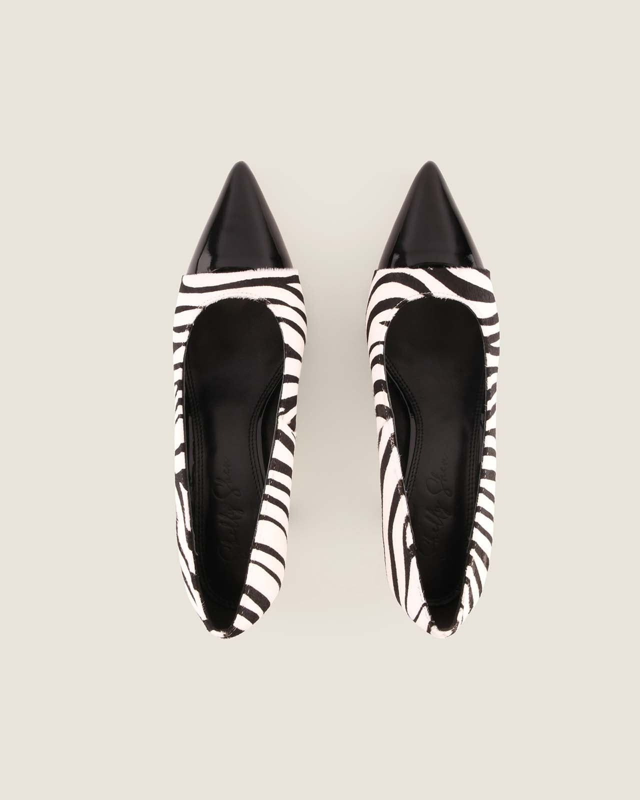 Pair of Aster High Heel Pumps in a Zebra Pattern