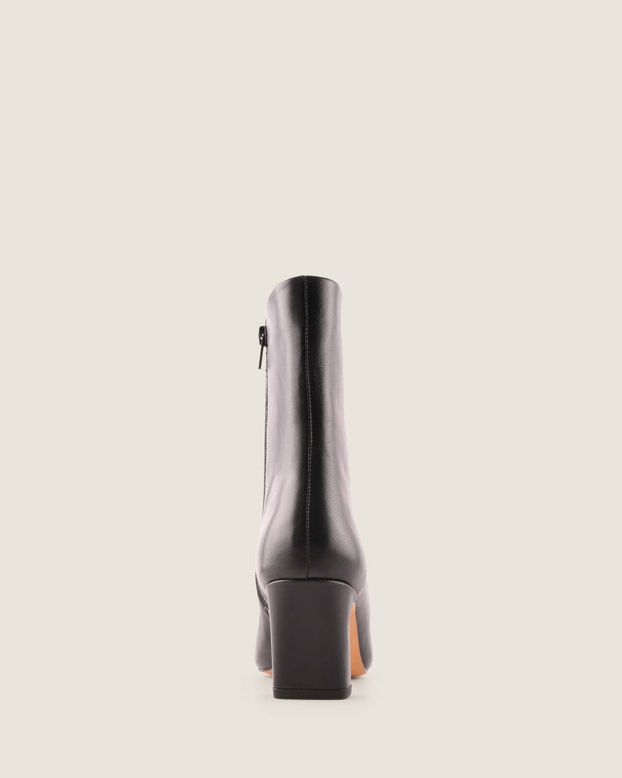 Back of Atlas heel ankle boot black leather