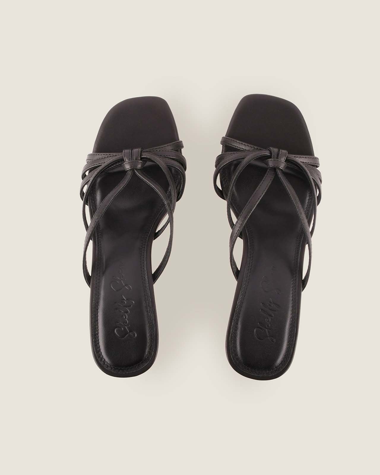 Pair of Birdie High Sandals Black Leather