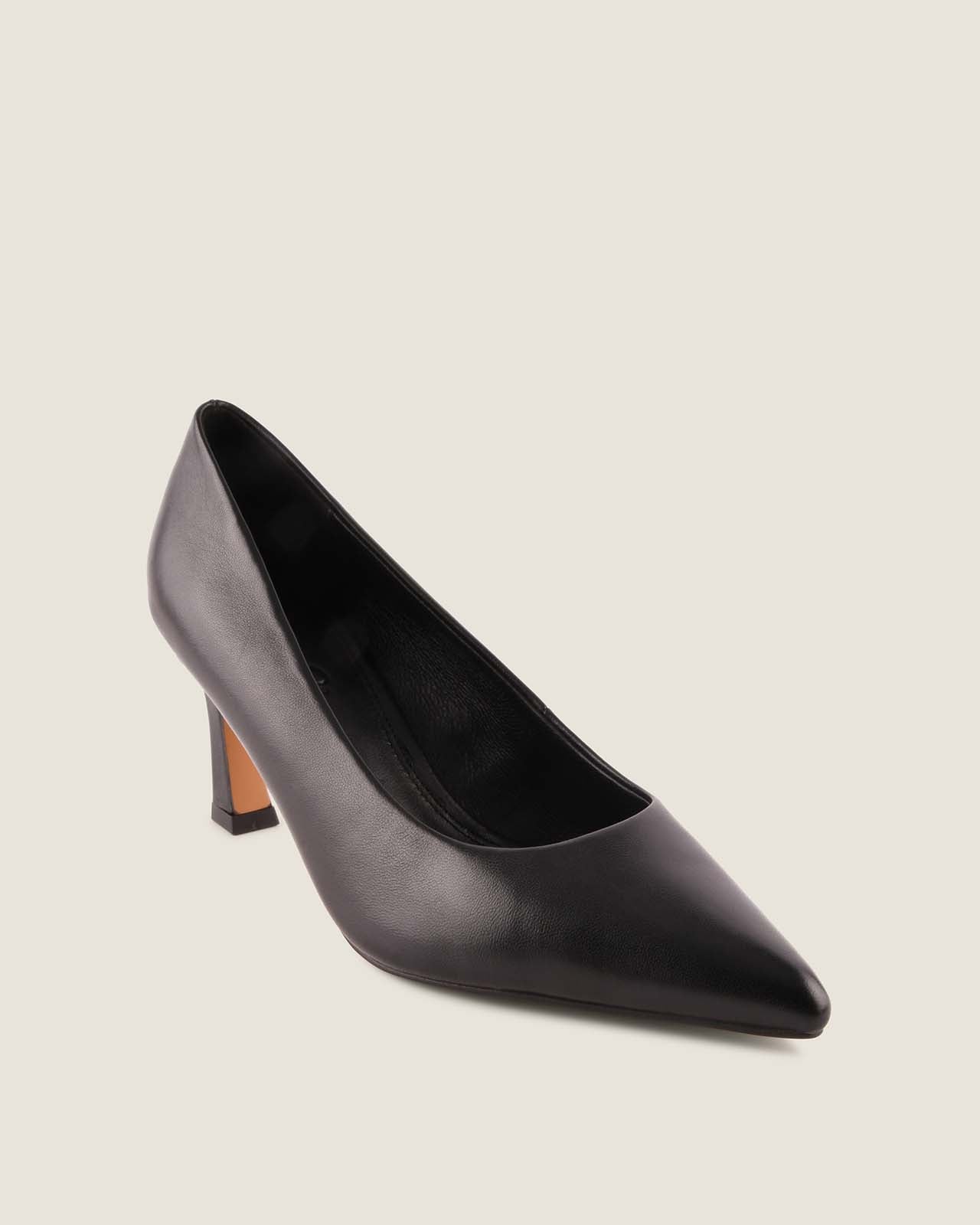 Black high-heeled shoe on a light gray background