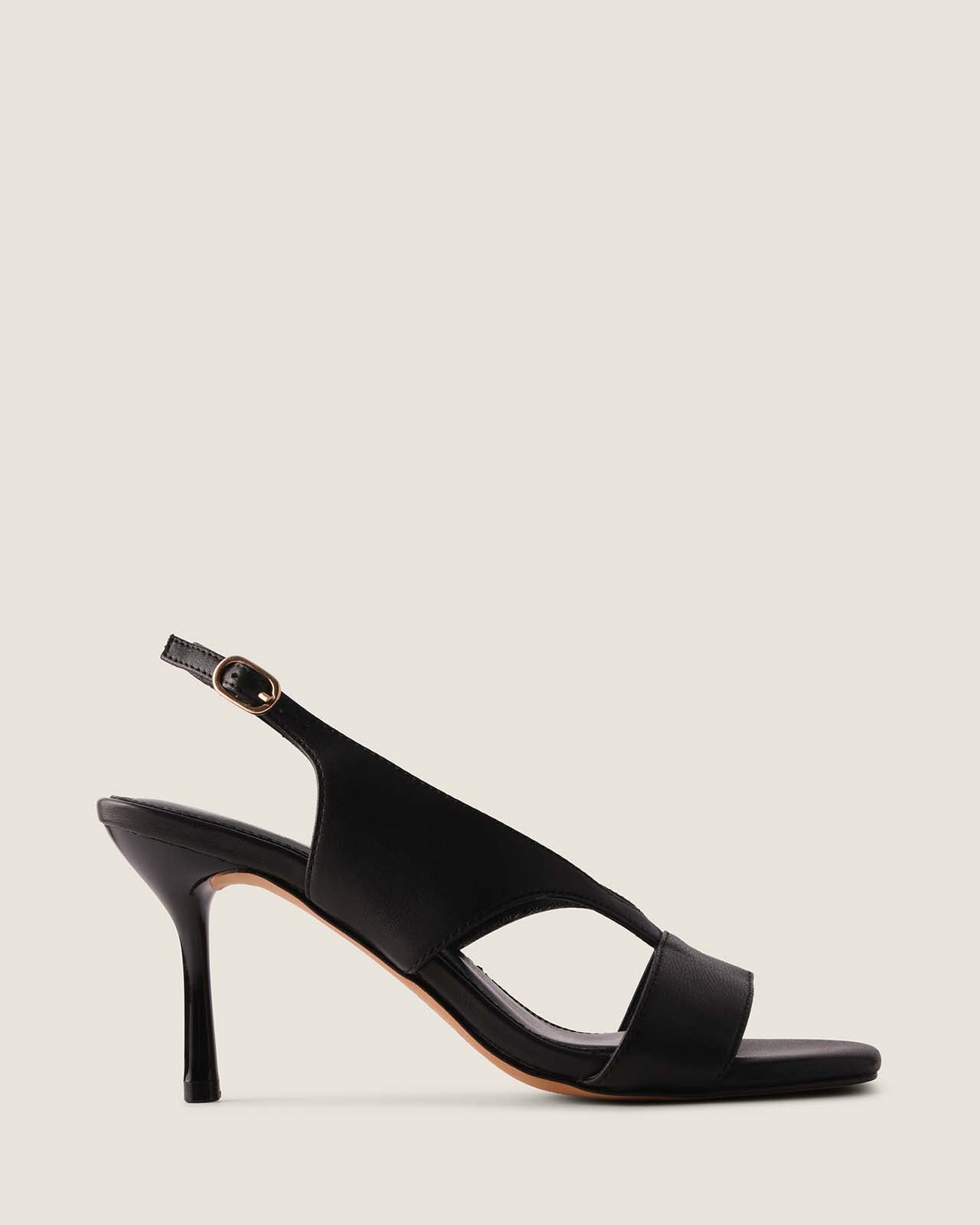 Black sandal on a light gray background