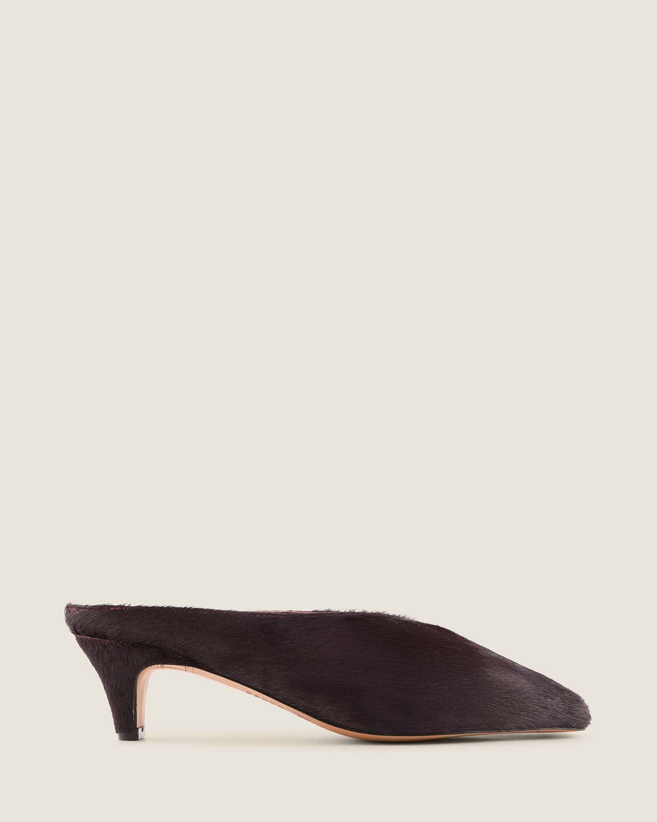 Burgundy low-heel shoe on a light grey background