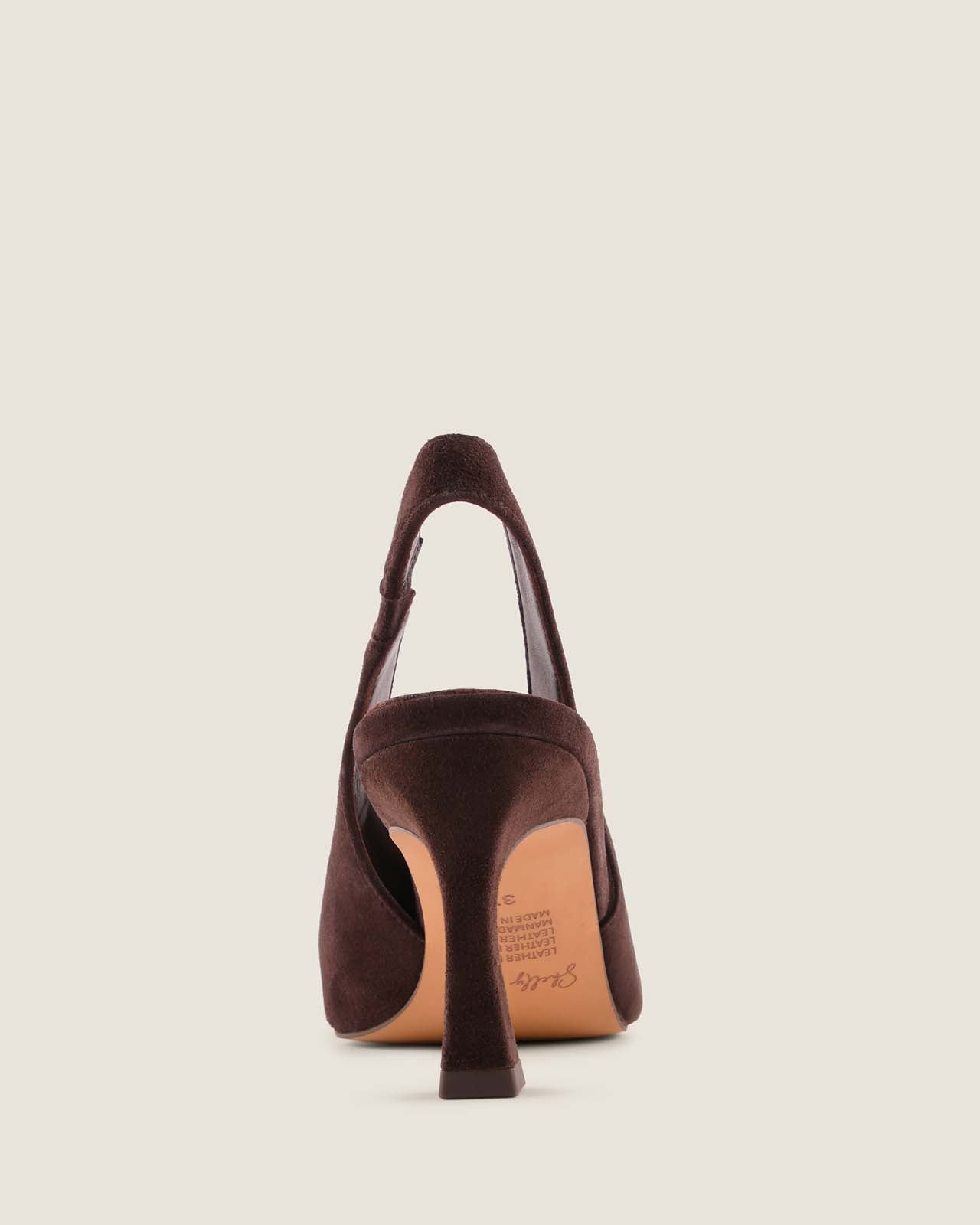 Brown high-heeled shoe on a light beige background
