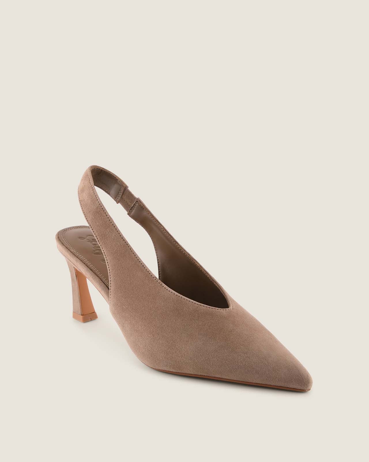 Taupe suede slingback shoe on a beige background