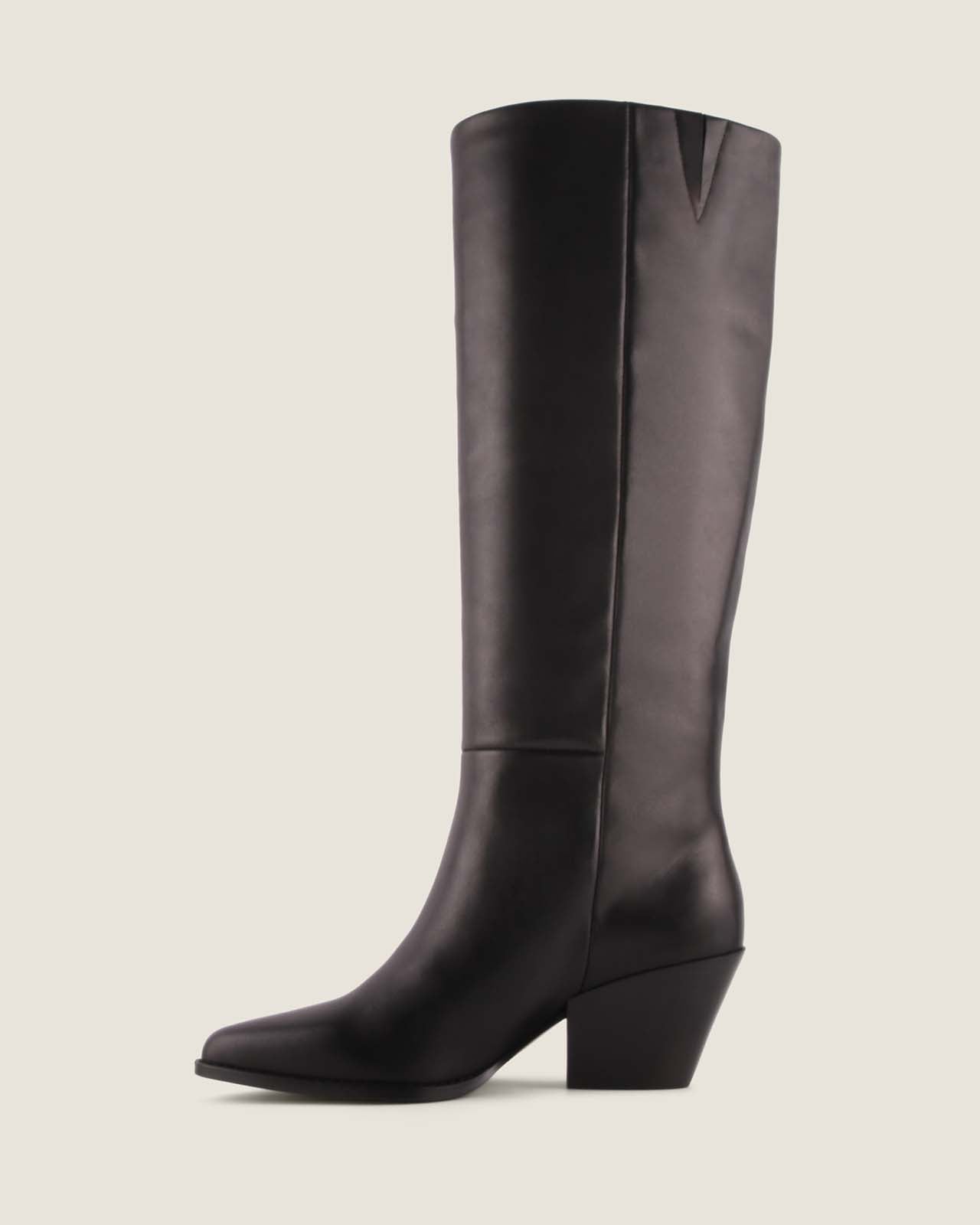 Black leather knee-high boot on a light grey background