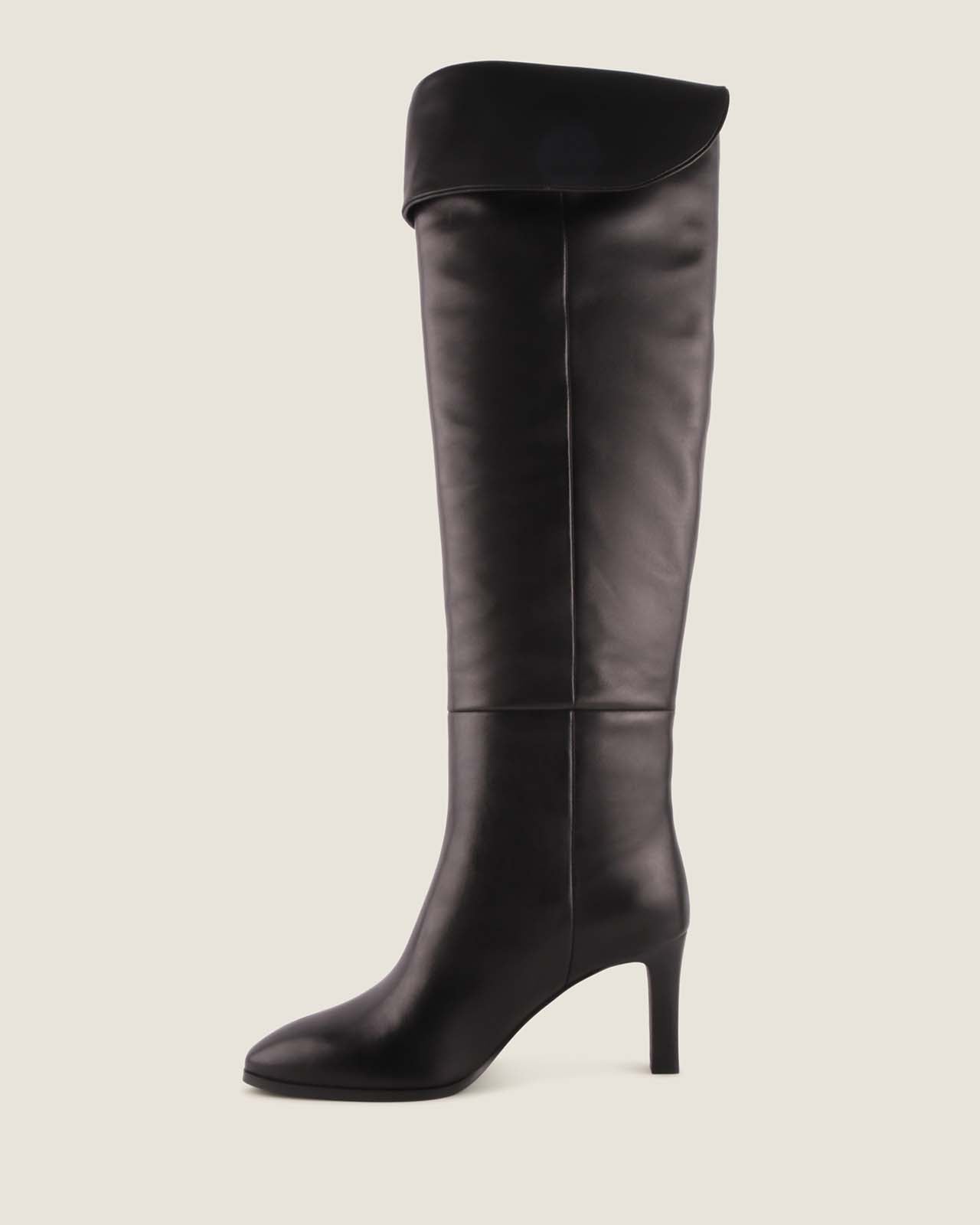 Black leather knee-high boot on a white background