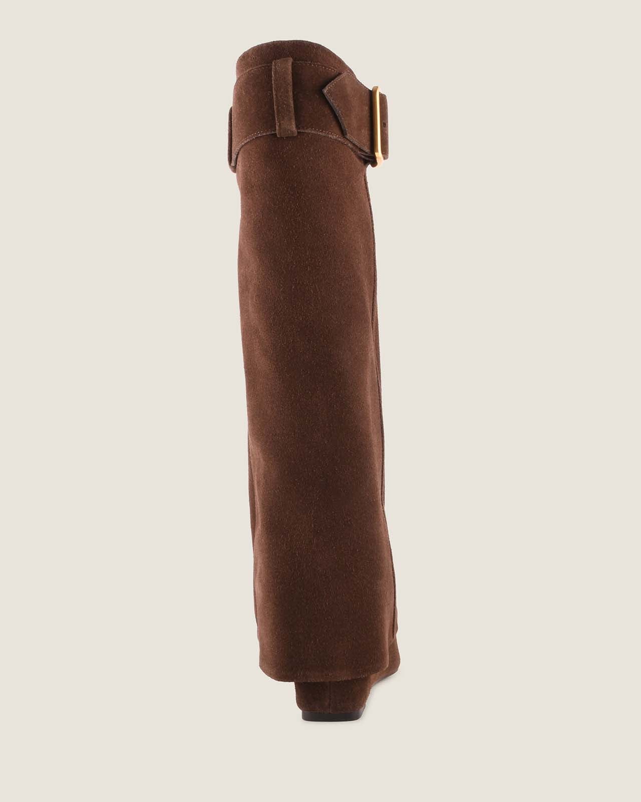 Brown knee-high boot with a buckle on a beige background