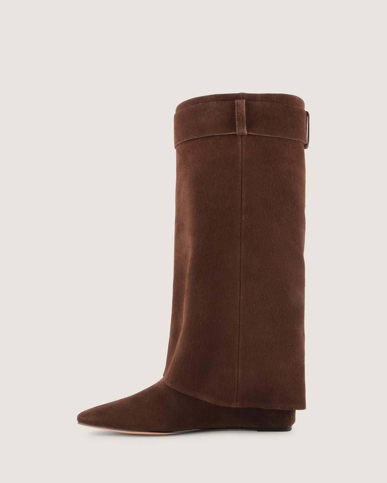 Brown knee-high boot on a light gray background
