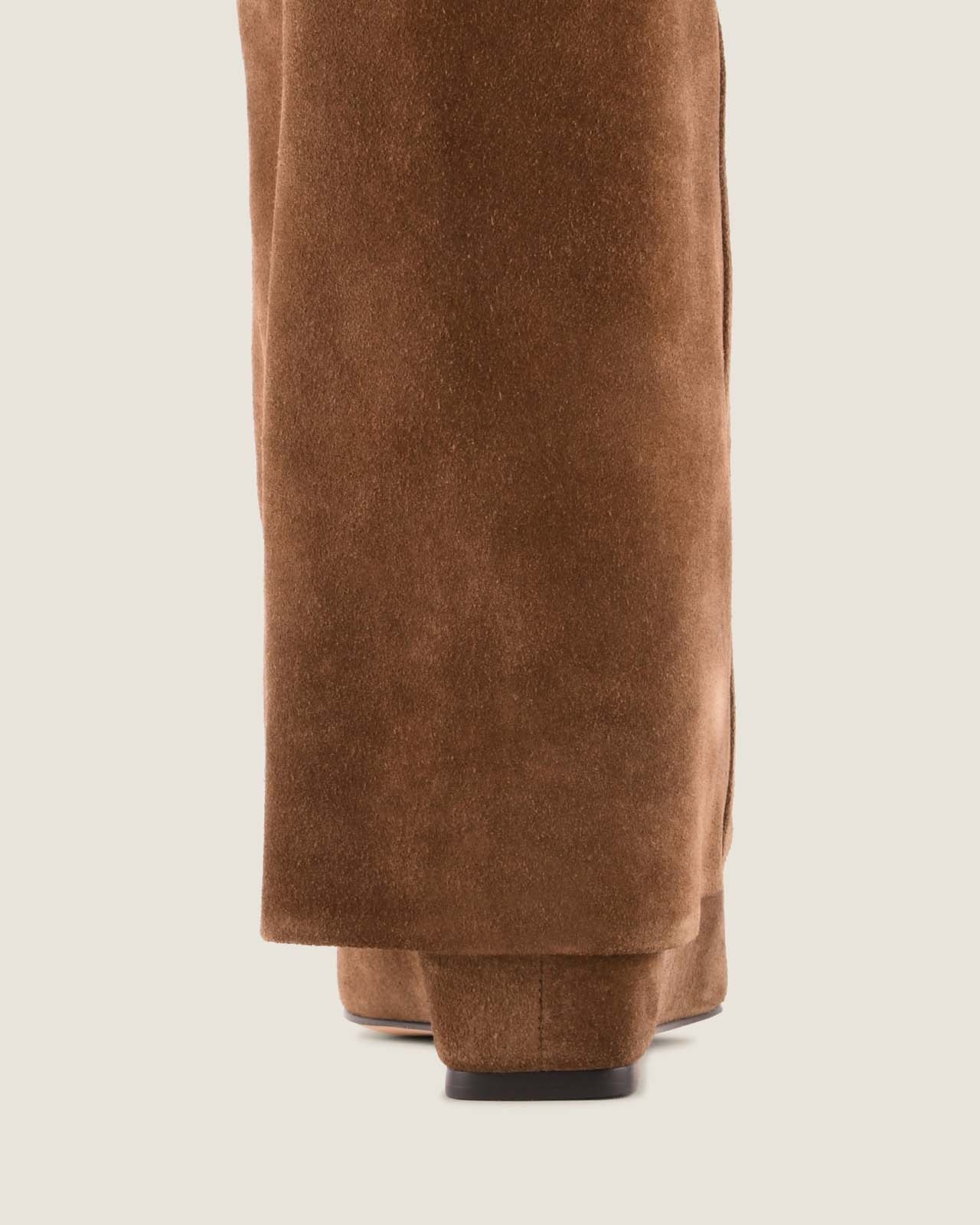 Brown suede skirt on a light gray background
